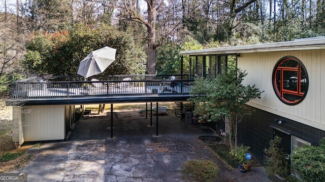 view of patio / terrace featuring a wooden deck