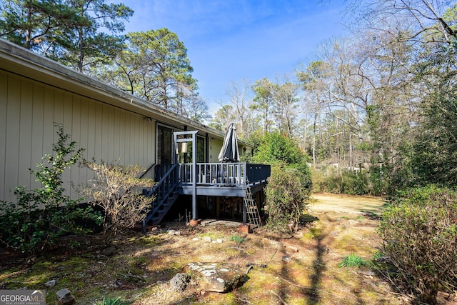 view of yard with a deck