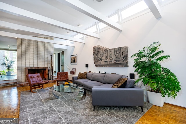 living room featuring parquet floors, a fireplace, and beamed ceiling