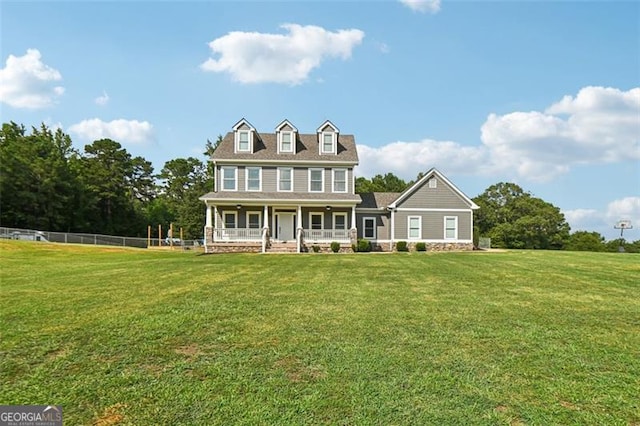 view of front facade featuring a front lawn and a porch