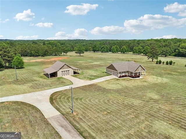 birds eye view of property with a rural view