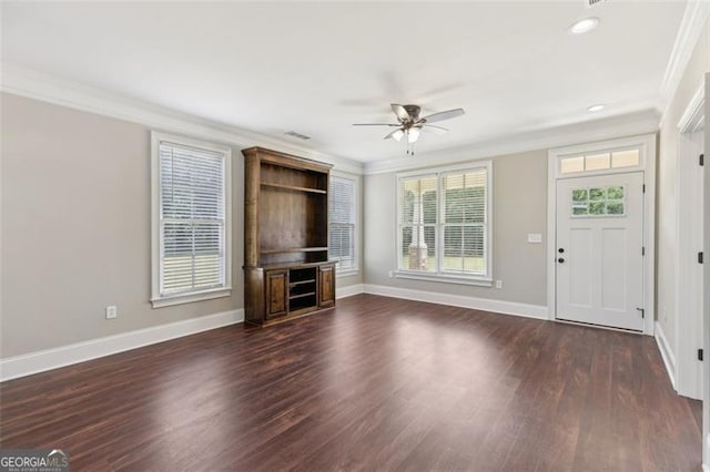 unfurnished living room with ornamental molding, dark hardwood / wood-style flooring, and ceiling fan