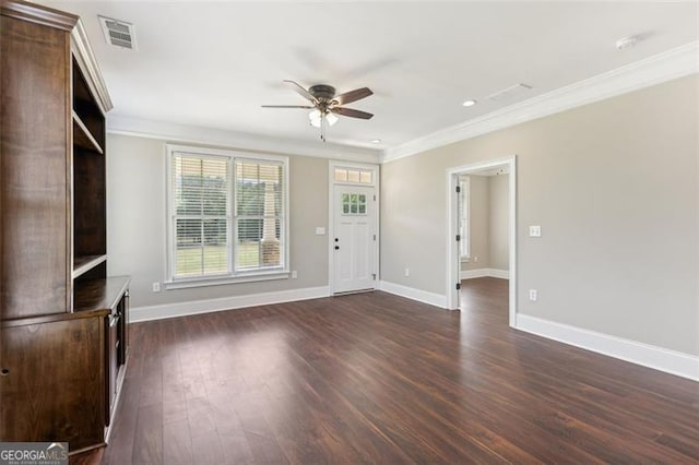 unfurnished living room with crown molding, dark hardwood / wood-style floors, and ceiling fan