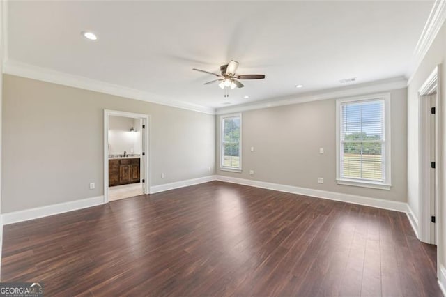 unfurnished room featuring dark hardwood / wood-style flooring, crown molding, and ceiling fan