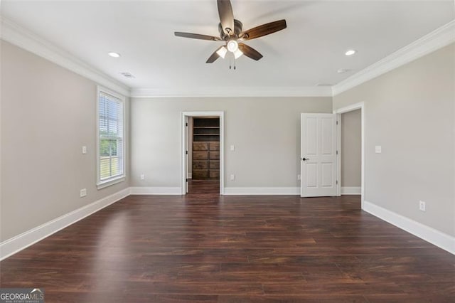 unfurnished room with ceiling fan, ornamental molding, and dark hardwood / wood-style flooring