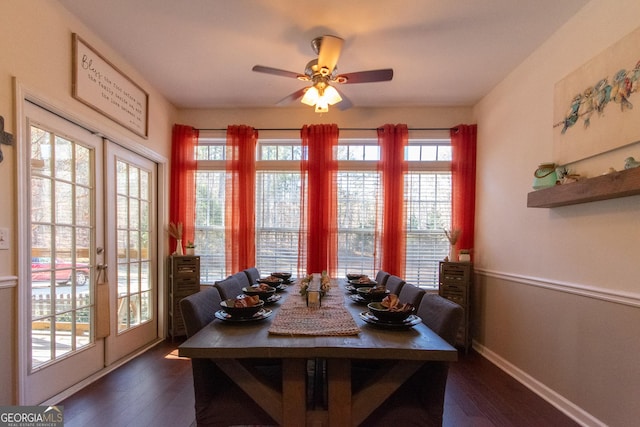 dining area featuring ceiling fan, dark hardwood / wood-style flooring, and french doors