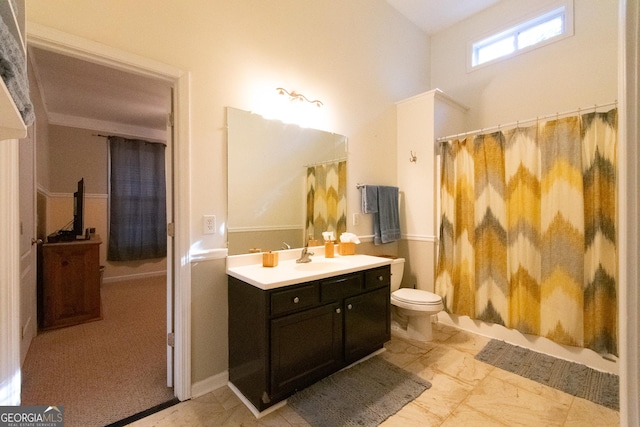 full bathroom with vanity, toilet, and shower / tub combo