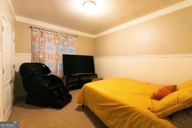 carpeted bedroom featuring crown molding