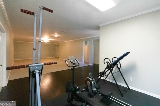 workout area with crown molding