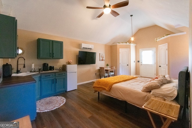 bedroom featuring a wall mounted air conditioner, white fridge, sink, ceiling fan, and dark hardwood / wood-style floors