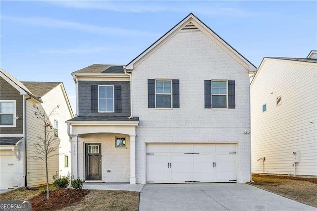 view of front property with a garage