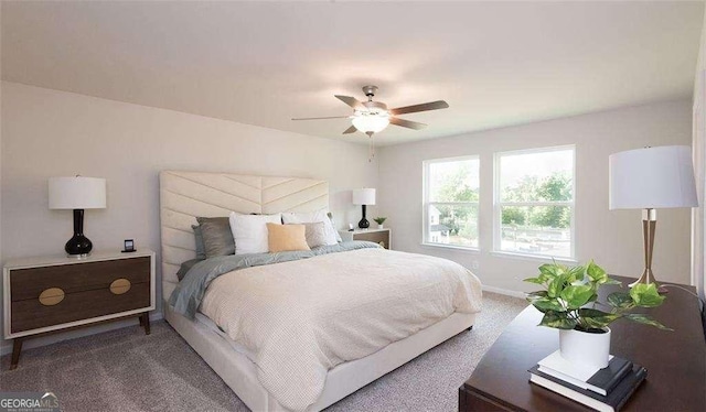 bedroom featuring ceiling fan and carpet floors