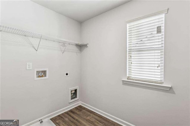 laundry room featuring hookup for a washing machine, hookup for an electric dryer, and dark wood-type flooring