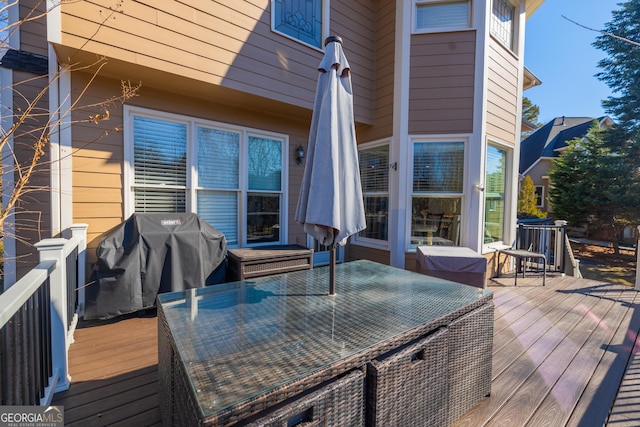 wooden terrace featuring grilling area