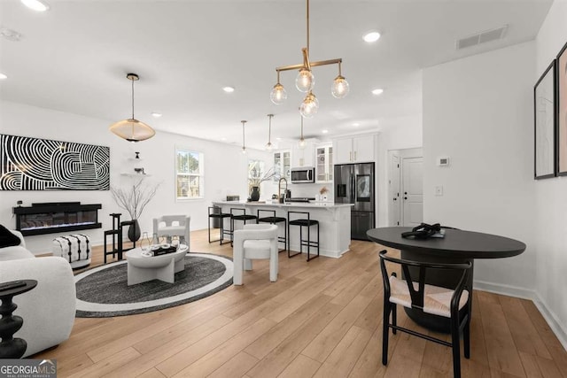 living room featuring light wood-type flooring