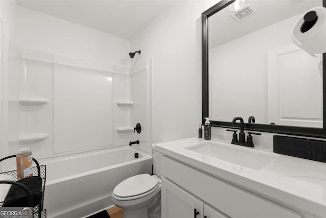 full bathroom with vanity, bathing tub / shower combination, and toilet