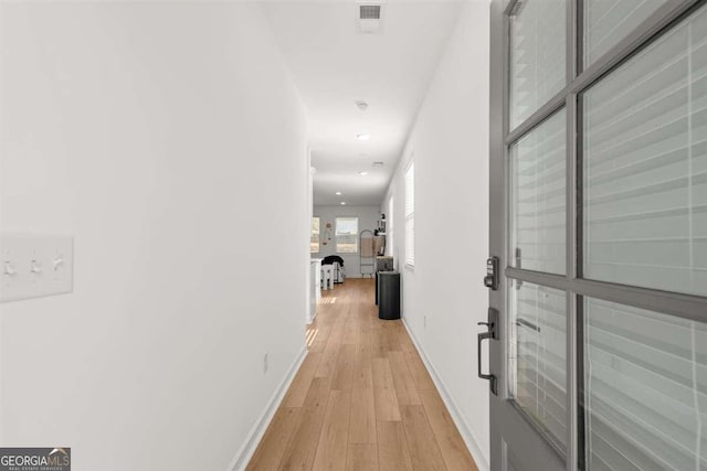 hallway featuring light wood-type flooring