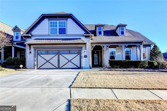 view of front of property featuring a garage