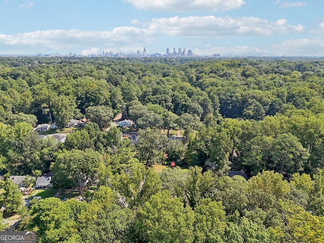 drone / aerial view with a view of trees