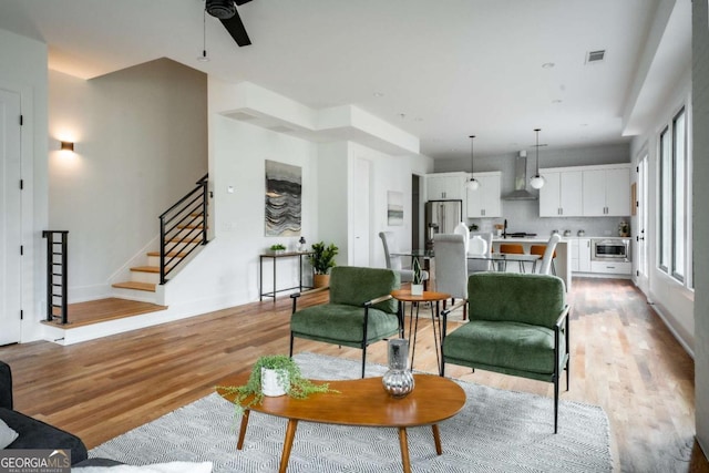 living room with light hardwood / wood-style floors