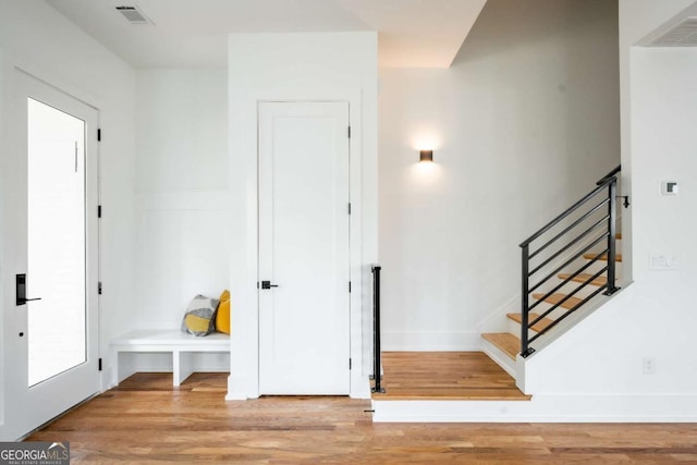 interior space with hardwood / wood-style floors