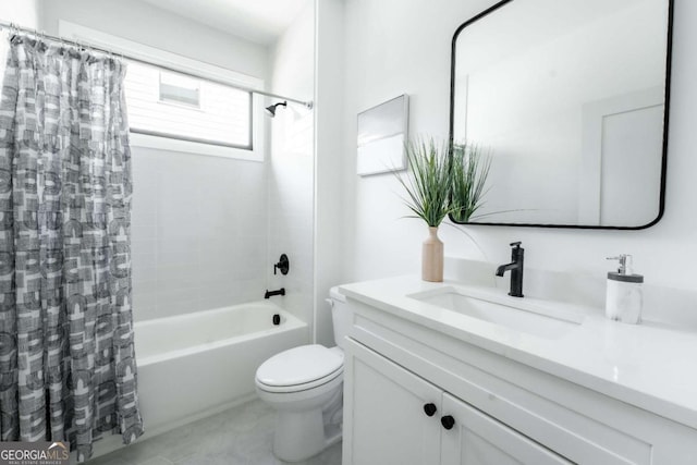 full bathroom featuring vanity, toilet, and shower / tub combo