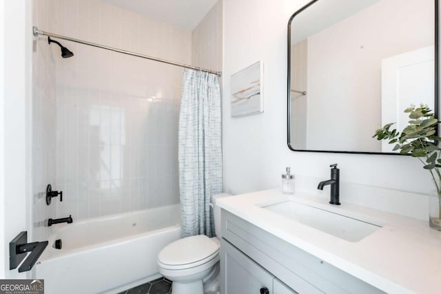 full bathroom with toilet, vanity, and shower / tub combo