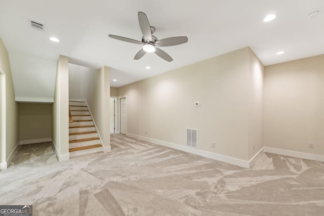 basement with baseboards, stairway, visible vents, and recessed lighting