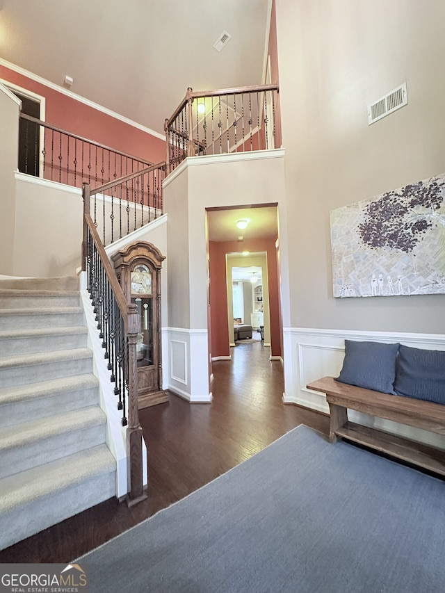 entryway with dark wood-type flooring