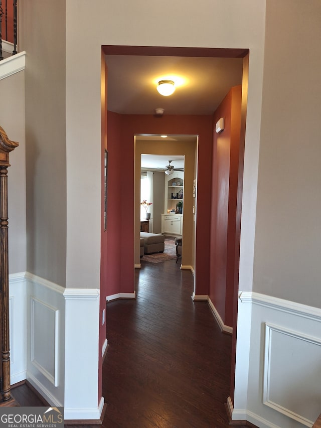 hall featuring dark wood-type flooring