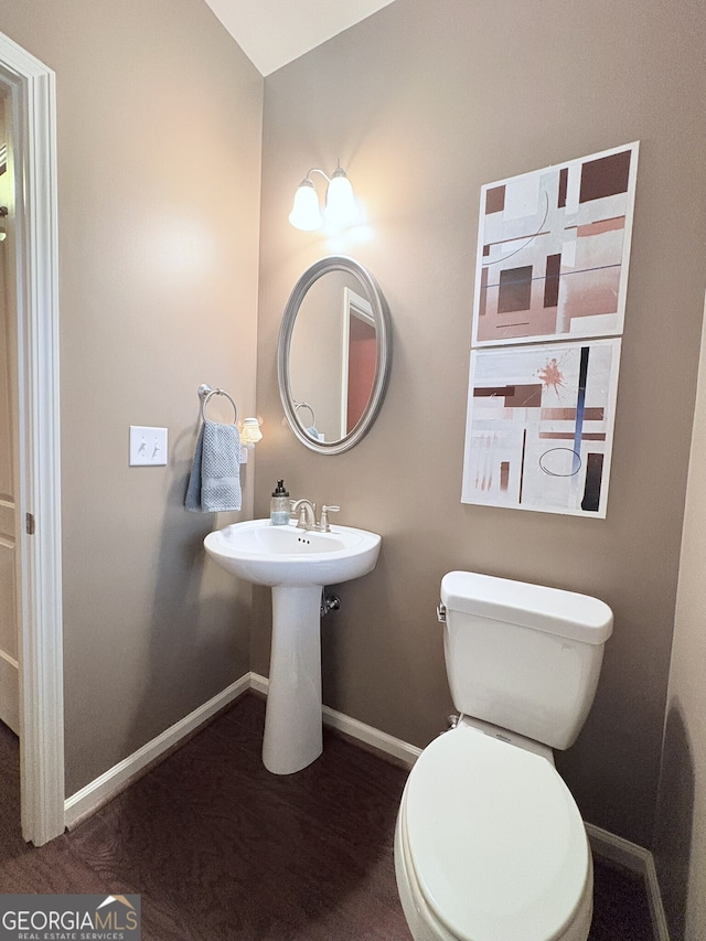 bathroom featuring sink and toilet