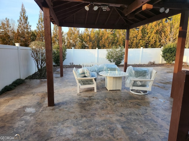 view of patio / terrace featuring a fenced backyard and a gazebo