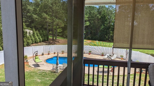 view of swimming pool with a fenced in pool, a patio area, and a fenced backyard