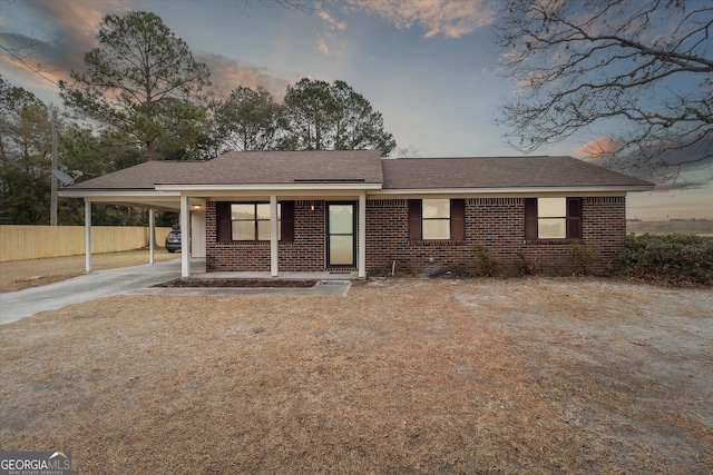 view of front facade featuring a carport