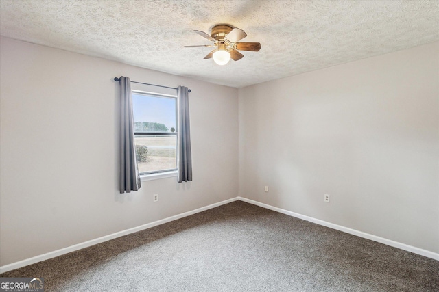 unfurnished room featuring carpet floors, a textured ceiling, and ceiling fan