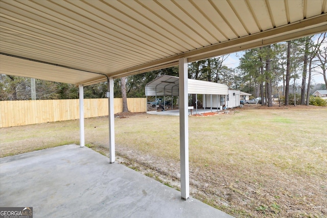 view of patio featuring a carport