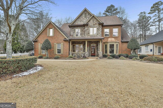 view of front of home featuring a front lawn