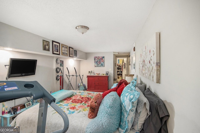 bedroom featuring a textured ceiling