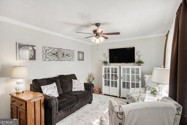 living room featuring ceiling fan and ornamental molding