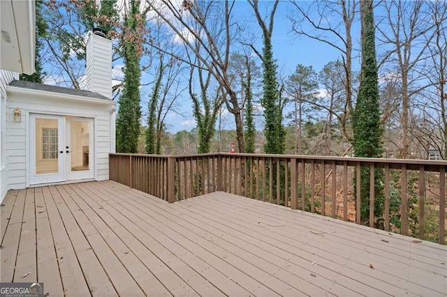 wooden terrace featuring french doors