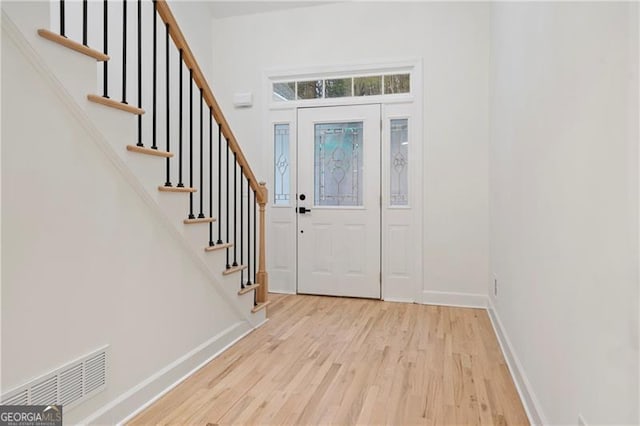 foyer entrance featuring light wood-type flooring