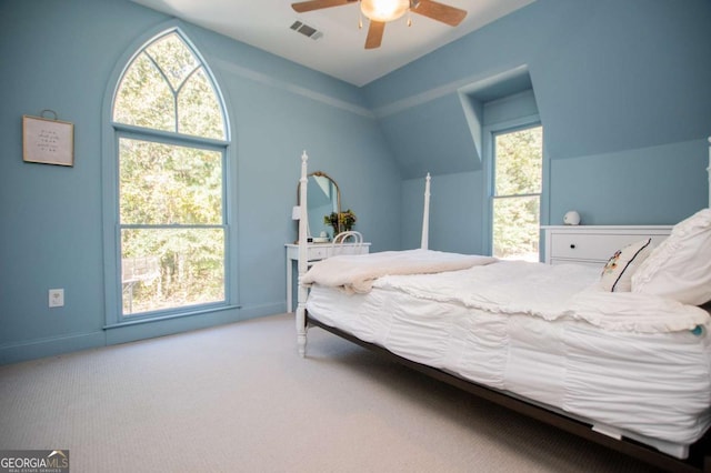 105 Fuller Dr, Carrollton, GA 30117 - bedroom with carpet, visible vents, vaulted ceiling, and a ceiling fan