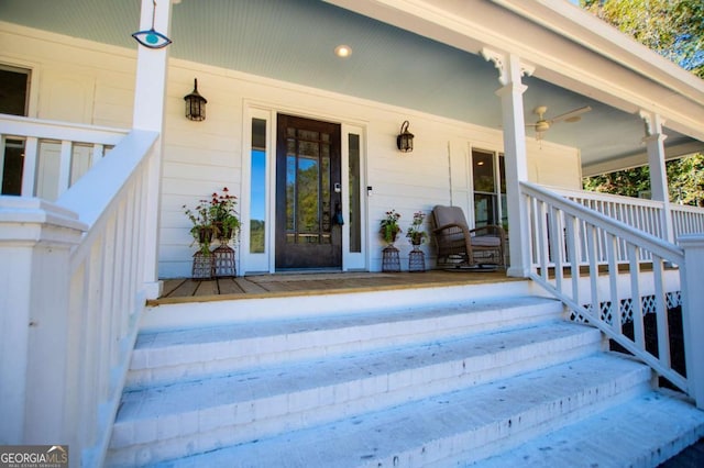 property entrance with covered porch and ceiling fan