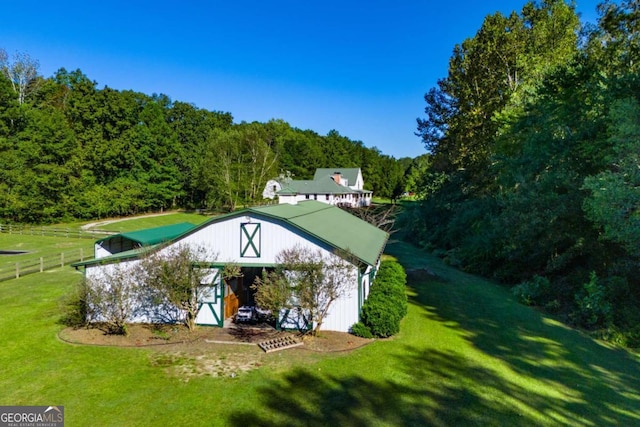 105 Fuller Dr, Carrollton, GA 30117 - exterior space featuring fence, a view of trees, and a yard