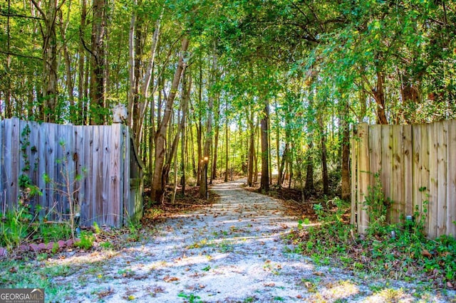 105 Fuller Dr, Carrollton, GA 30117 - view of street with a wooded view