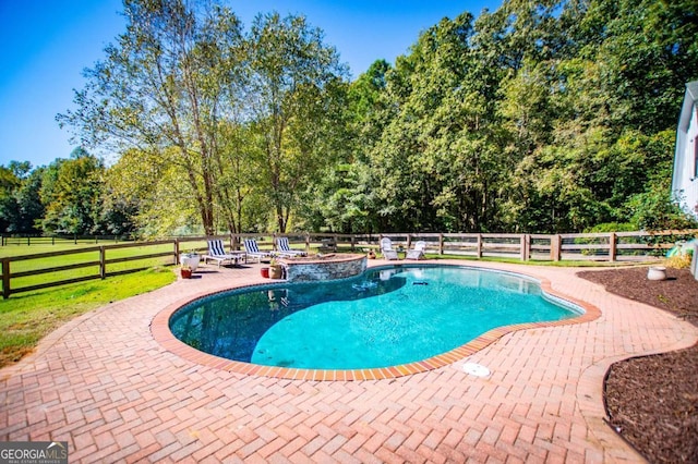 view of pool with a patio area