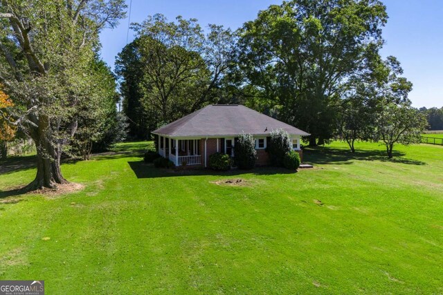 view of yard with a porch