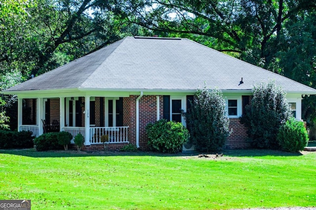 view of front of property with a front yard and a porch