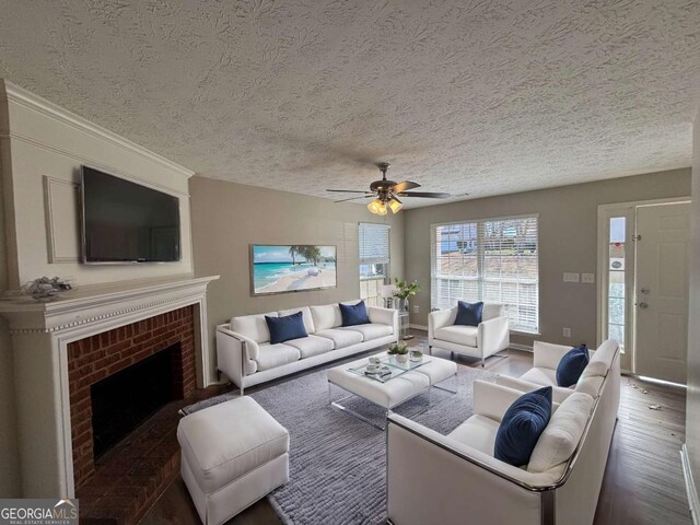 dining area featuring hardwood / wood-style flooring, a textured ceiling, and ornamental molding