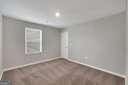 5337 Tolar Rd Unit 61, South Fulton, GA 30213 - spare room featuring baseboards